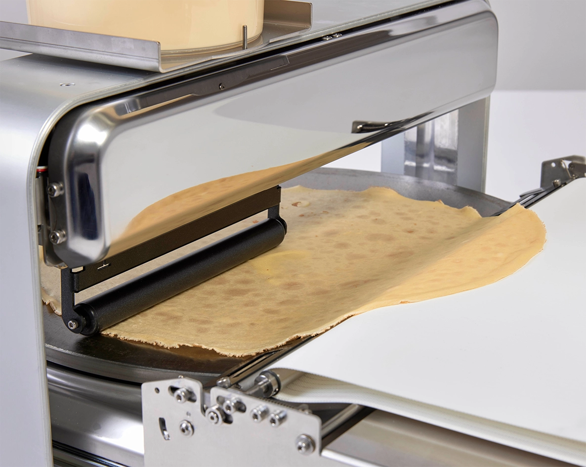 焼き上げだけでなく取り出しまで自動で行います。